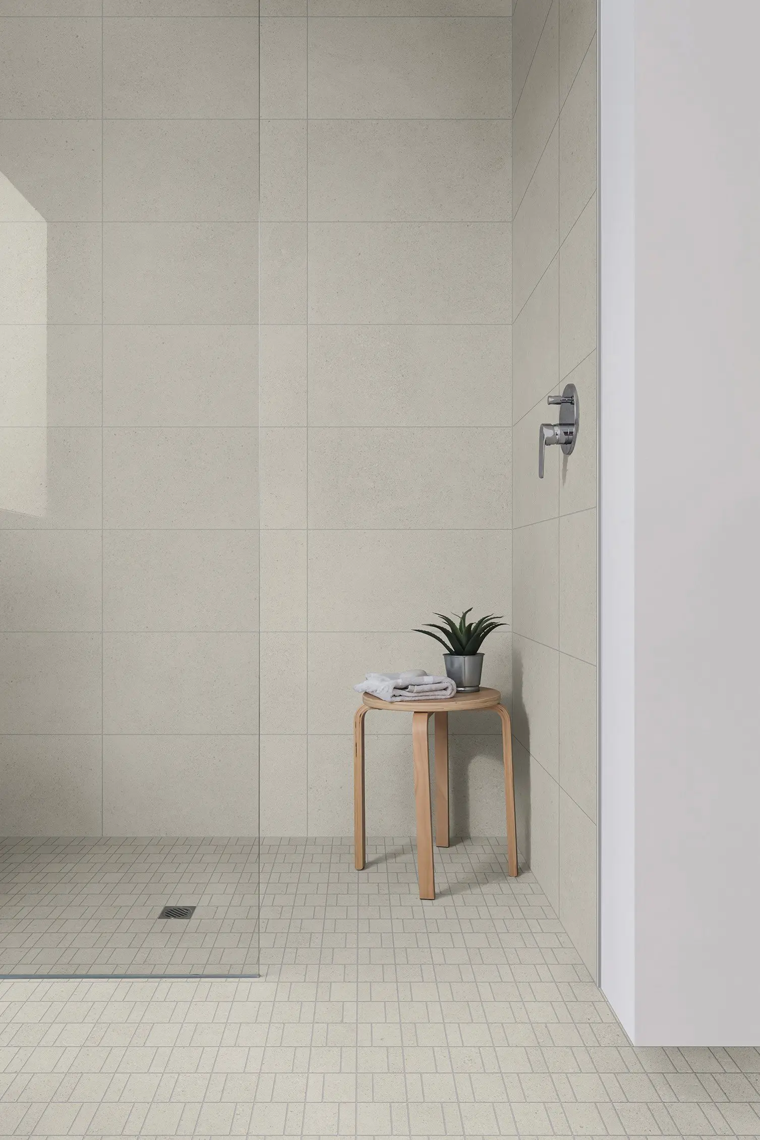 Elegant bathroom featuring a potted plant.